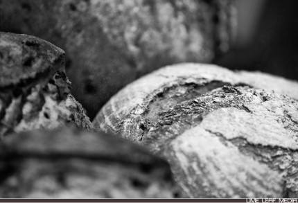 Black and white photo of bread with flour
