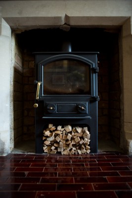 Iron fireplace with wood