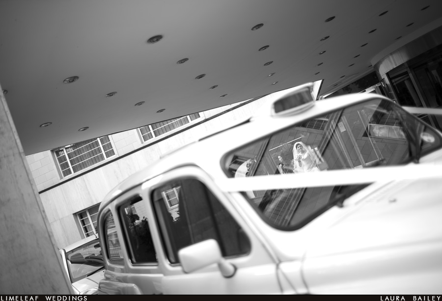Ashley approaching taxi outside the Melia Hotel