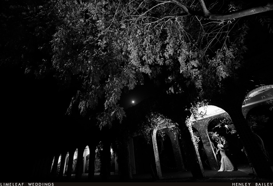 Alan and Ashley pose for photo in the Orangery/Belvedere arches
